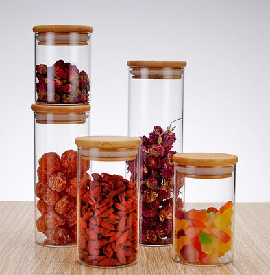 comprar ODM / OEM personalizado elegante casa Jato de vidro redondo de armazenamento 8oz 26oz Jato de vidro de armazenamento de alimentos com tampa de bambu hermética Design elegante e prático online manufacture