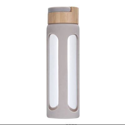 comprar 550/750ml personalizado garrafa de água de vidro de alto borosilicato garrafa de bebida de vidro personalizada com manga de silicone e tampa de bambu fácil de limpar e manter online manufacture
