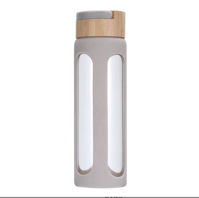 comprar 550/750ml personalizado garrafa de água de vidro de alto borosilicato garrafa de bebida de vidro personalizada com manga de silicone e tampa de bambu fácil de limpar e manter online manufacture